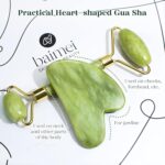 A BAIMEI IcyMe green jade roller and a matching green jade gua sha tool displayed together in elegant packaging.
