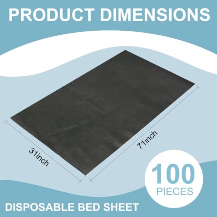 Stack of 100 black disposable massage table sheets, folded neatly, with one sheet partially unfolded on a table.