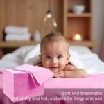 Stack of 100 pink disposable waterproof massage table sheets, unfolded to show texture.