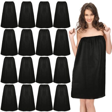 A stack of individually wrapped black disposable spa wraps, showing the non-woven fabric texture and adjustable design.