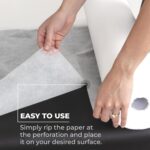 Roll of MASERTIO Disposable Massage Bed Covers, white non-woven material, for professional spa and salon use.