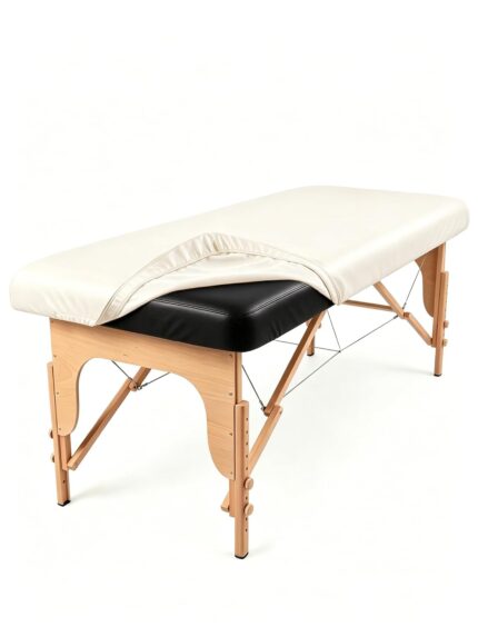 Off-white PU leather waterproof massage table cover with elastic edges, shown fitted on a massage bed.