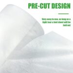 White roll of Platonee disposable non-woven massage table sheets, pre-perforated for 50 individual covers.