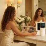 SUMBOHK hot towel warmer machine on a countertop, dispensing a warm, moist towel for facial use.