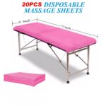 Stack of 20 pink disposable non-woven fabric massage table sheets, folded neatly.