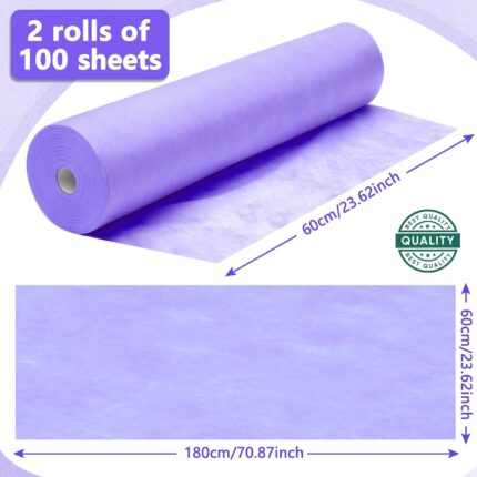 Two rolls of purple Tudomro disposable non-woven massage table sheets, unrolled slightly to show texture.